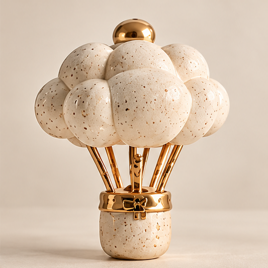 UBRINLY hot air balloon Christmas decoration with speckled cream balloon shapes, gold-tone supports and bow detail against a neutral background.