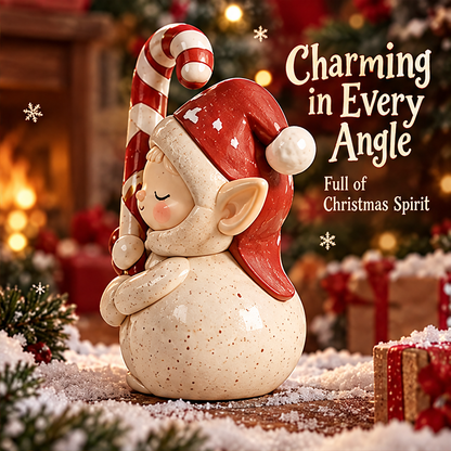 Side view of the Christmas elf showing its pointed ear, red pom-pom hat, rounded cream body and striped candy cane.