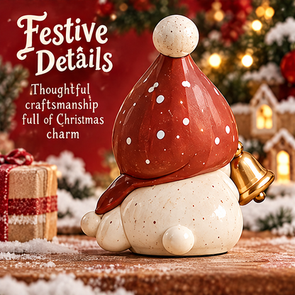 Rear view of the Christmas figurine showing the red dotted hat, scarf detail and rounded speckled cream body.