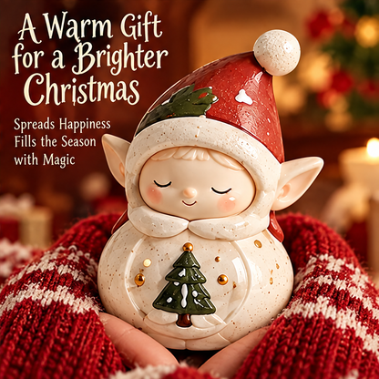 Tree-holding Christmas elf figurine cradled in hands wrapped in red-and-white knitted fabric against a festive background.